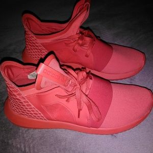Red Adidas tubulars womens